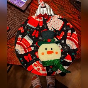 Large bell ornament with frosty the snowman attach.